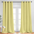 NICETOWN Room Darkening Curtains Panels for Window - Home Fashion Machine Washable Ring Top Solid Room Darkening Draperies for Kid's Room (2 Panels, 52 inches W x 95 inches, Paler Yellow)