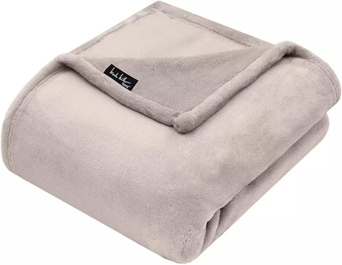 Nicole Miller Oversized Plush Fleece Throw Blanket – Ultra Soft, Lightweight & Cozy – 60" x 70" Warm Flannel Blanket for Couch, Bed & Travel – Machine Washable (Pumice-Tan)
