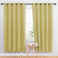 NICETOWN Room Darkening Curtain Panels 72 - Window Treatment Energy Saving Thermal Insulated Solid Grommet Room Darkening Drapes for Living Room (Paler Yellow, 1 Pair, 66 by 72-Inch)