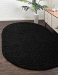 Unique Loom Solid Shag Collection Area Rug (5' 1" x 8' Oval, Jet Black)