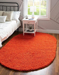Unique Loom Solid Shag Collection Area Rug (8' x 10' Oval, Tiger Orange)