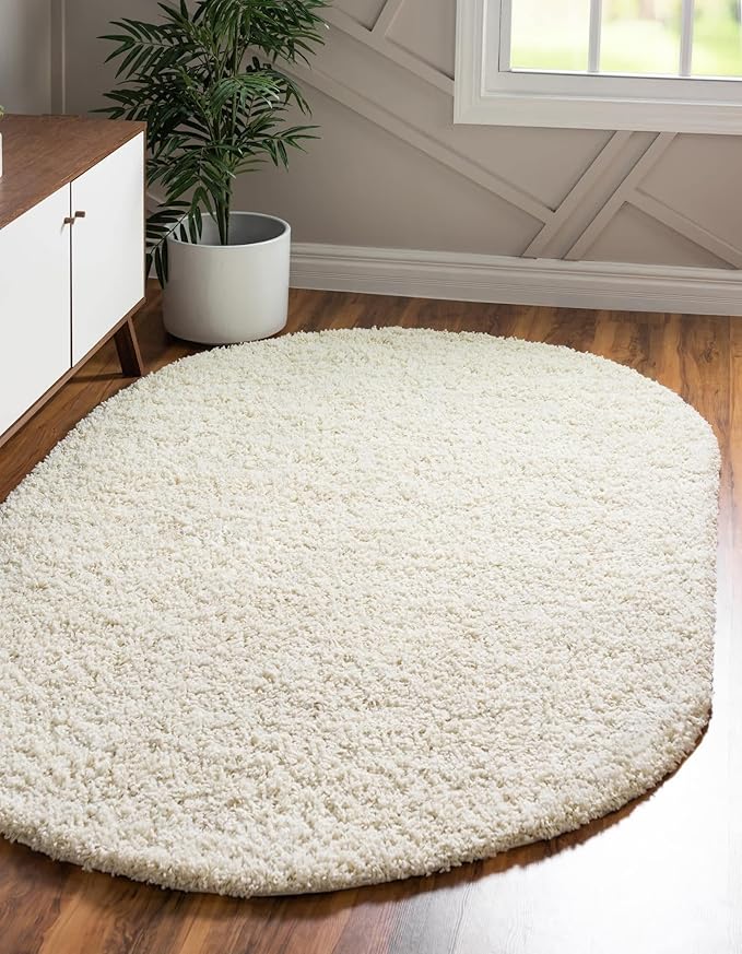 Unique Loom Solid Shag Collection Area Rug (5' 1" x 8' Oval, Pure Ivory)