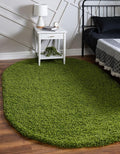 Unique Loom Solid Shag Collection Area Rug (5' 3" x 8' Oval, Grass Green)
